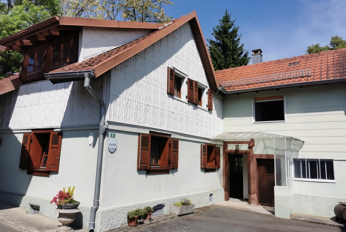 Maison de 166 m² à Manspach avec double logement et dépendance 