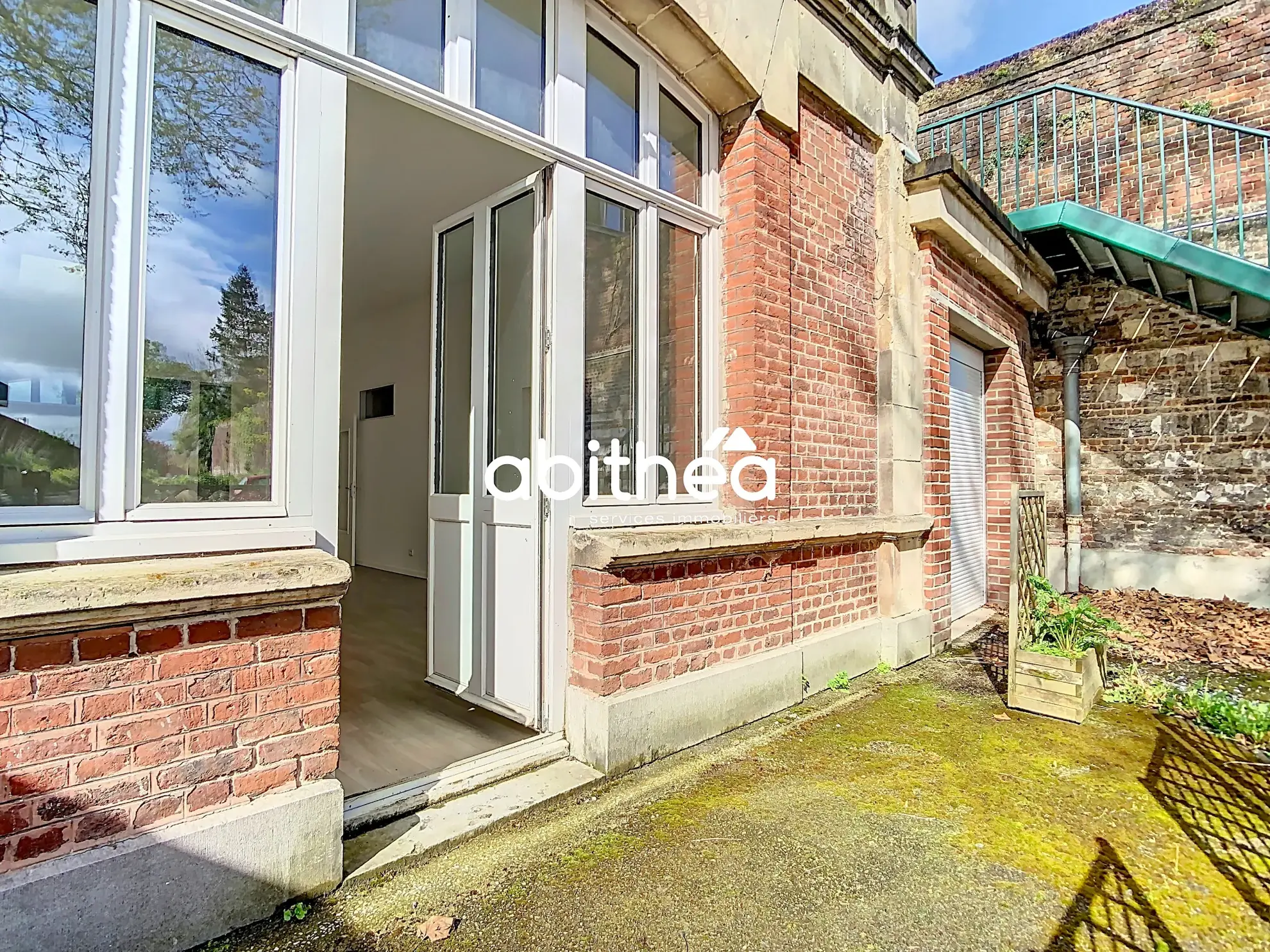 Appartement T4 en rez de jardin à Arras avec terrasse, cave et parking 
