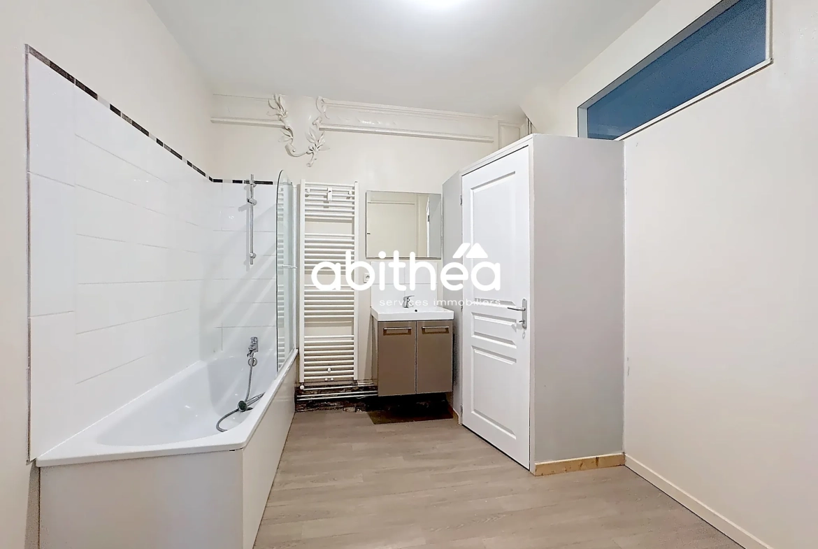 Appartement T4 en rez de jardin à Arras avec terrasse, cave et parking 