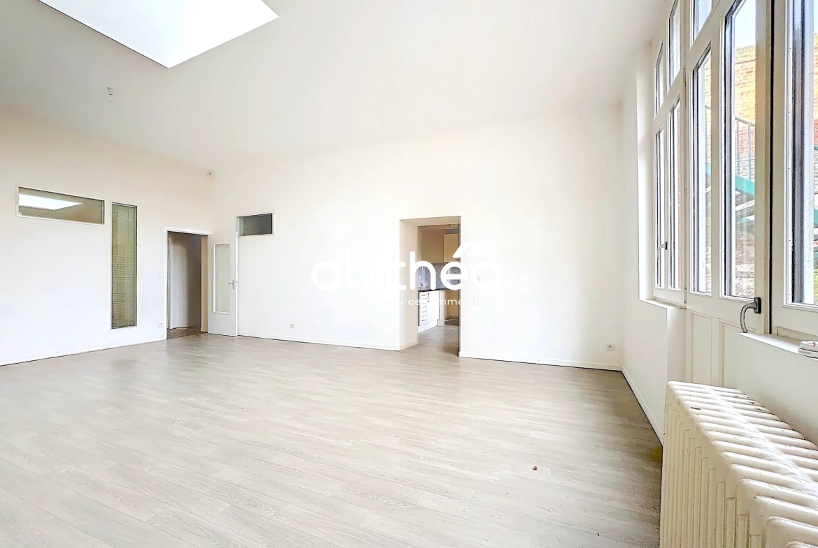 Appartement T4 en rez de jardin à Arras avec terrasse, cave et parking 
