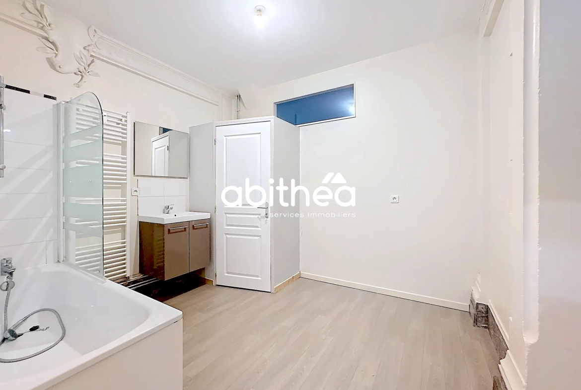 Appartement T4 en rez de jardin à Arras avec terrasse, cave et parking 