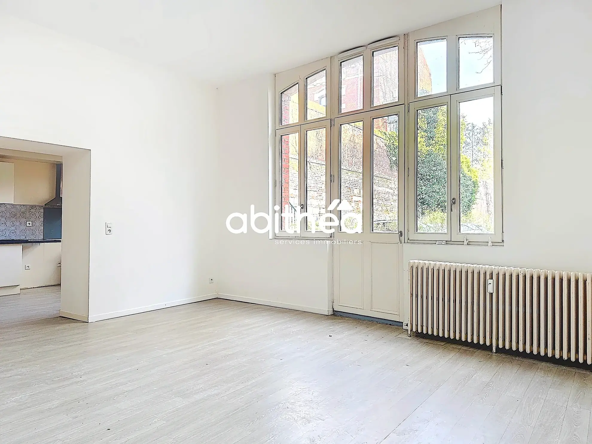 Appartement T4 en rez de jardin à Arras avec terrasse, cave et parking 