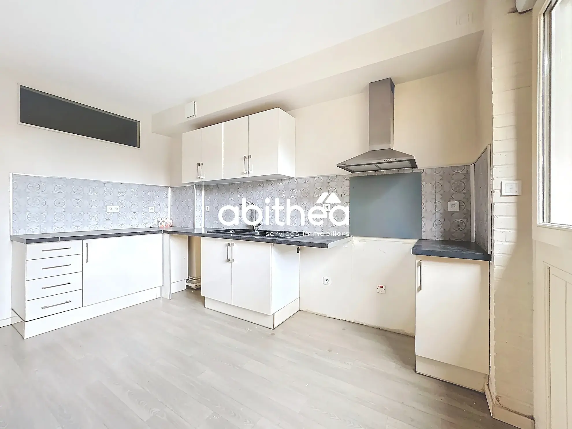 Appartement T4 en rez de jardin à Arras avec terrasse, cave et parking 