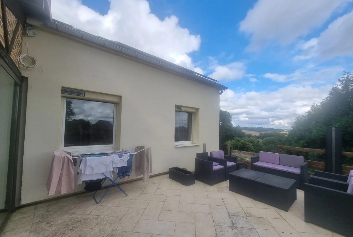 Maison de 90 m² avec grand terrain et double garage près de Le Mêle-Sur-Sarthe 