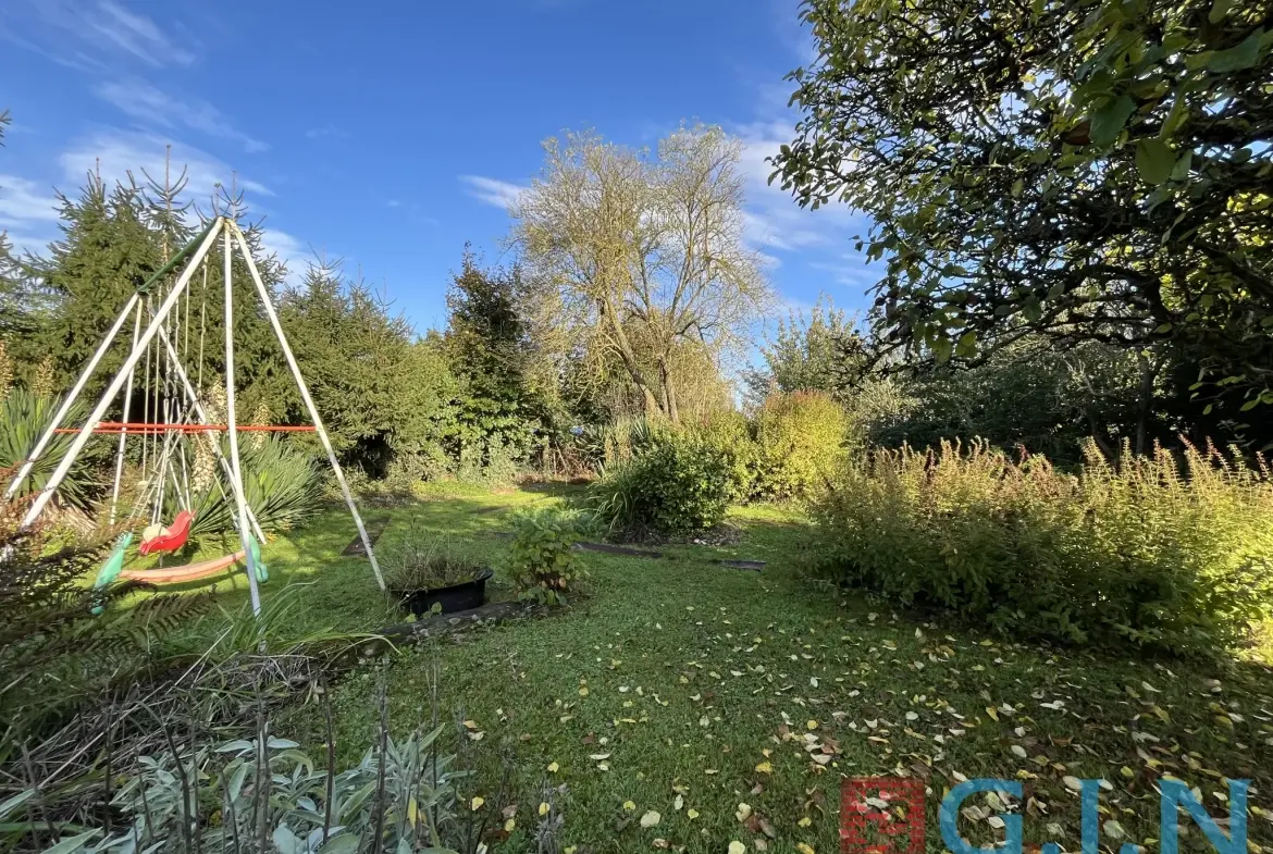 Maison de maître à Boos avec dépendance et jardin arboré 
