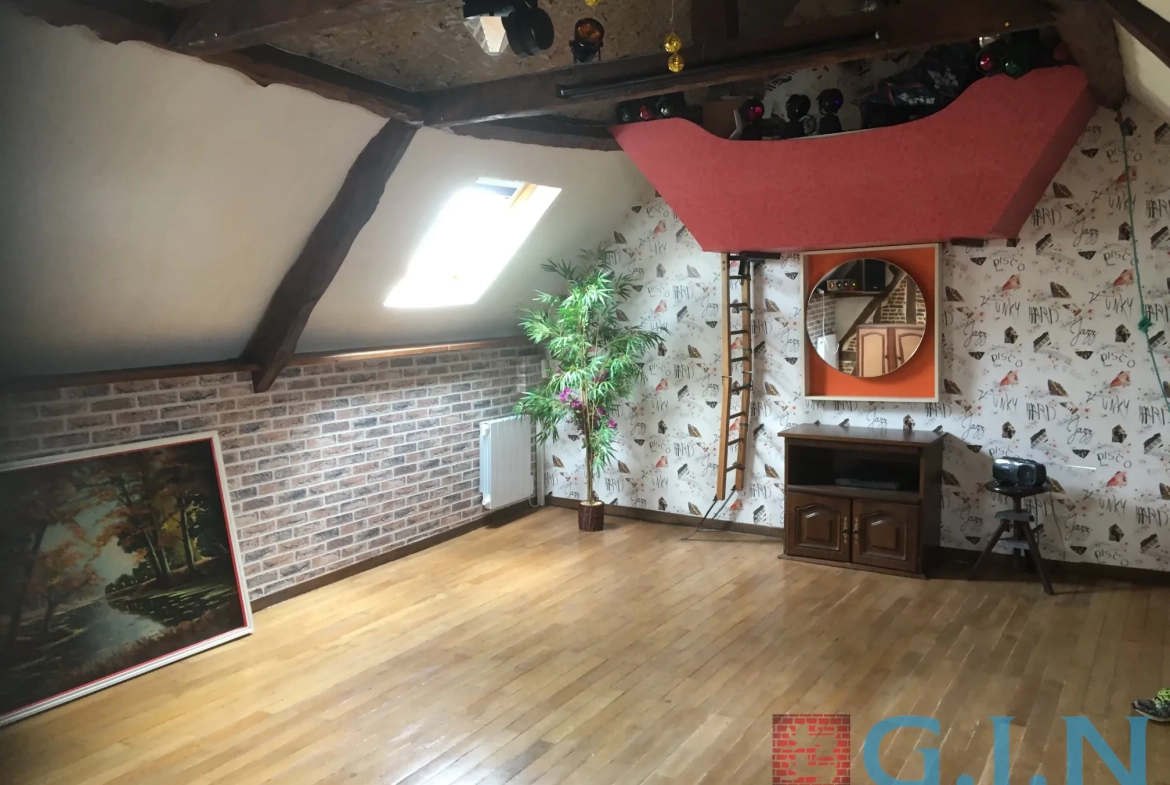 Maison de maître à Boos avec dépendance et jardin arboré 