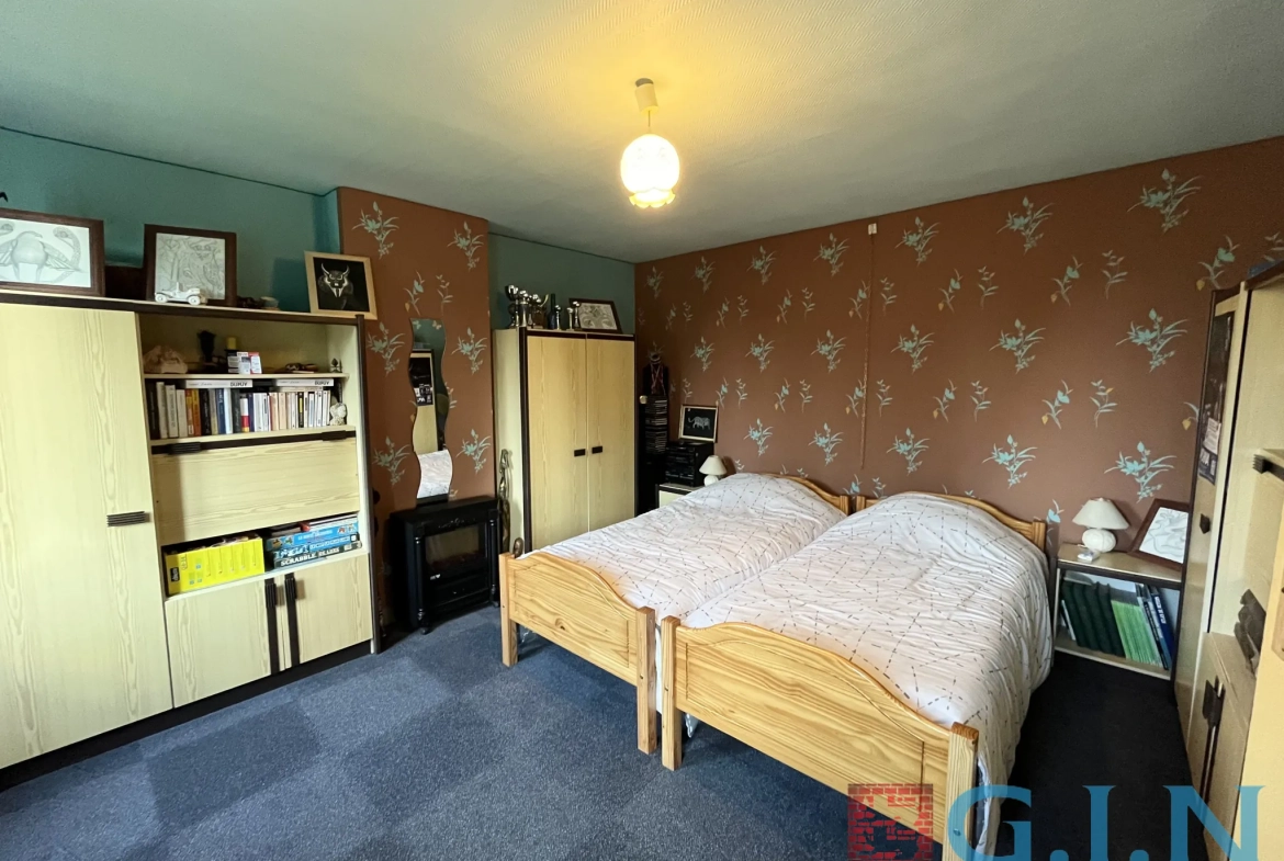 Maison de maître à Boos avec dépendance et jardin arboré 