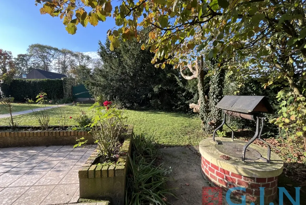 Maison de maître à Boos avec dépendance et jardin arboré 