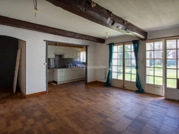 Immeuble pierre 154m² avec maison et local commercial en plein centre de Créon