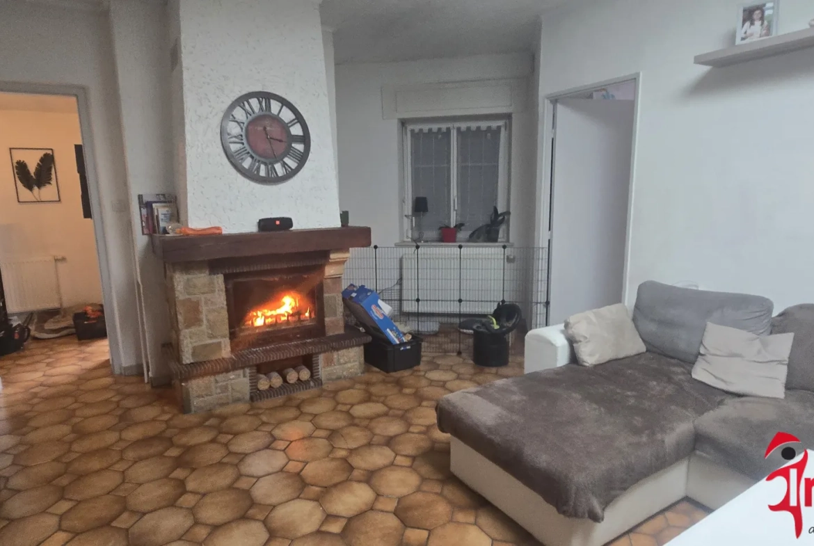 Investissement immobilier à Bartenheim : immeuble avec local commercial et appartement loués 