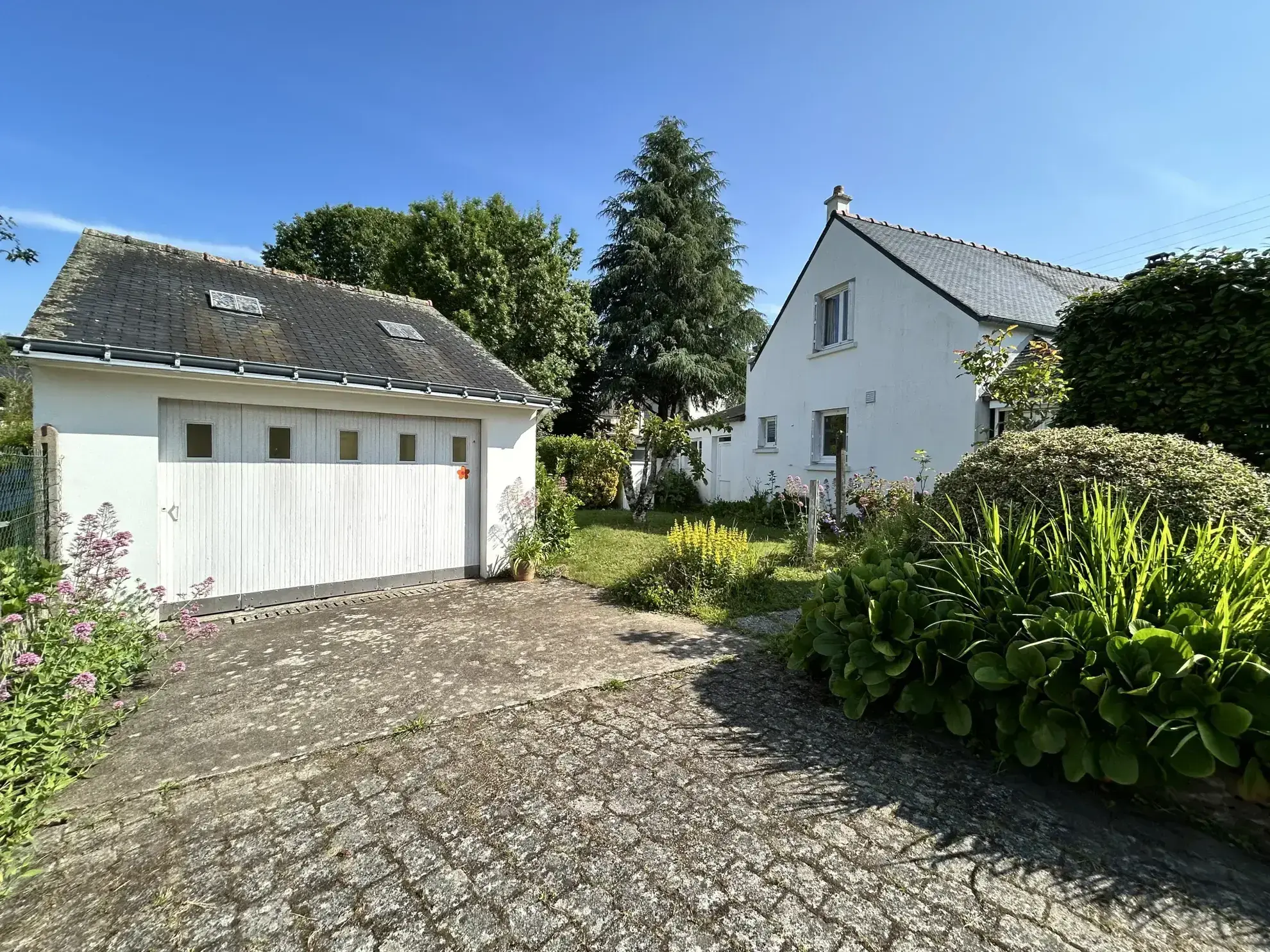 Maison familiale de 87 m² avec jardin et garage à Pluméliau, proche du Blavet 