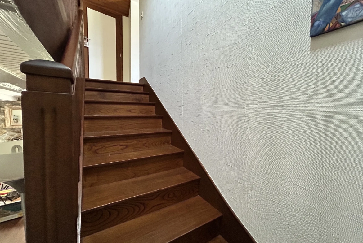 Maison familiale de 87 m² avec jardin et garage à Pluméliau, proche du Blavet 
