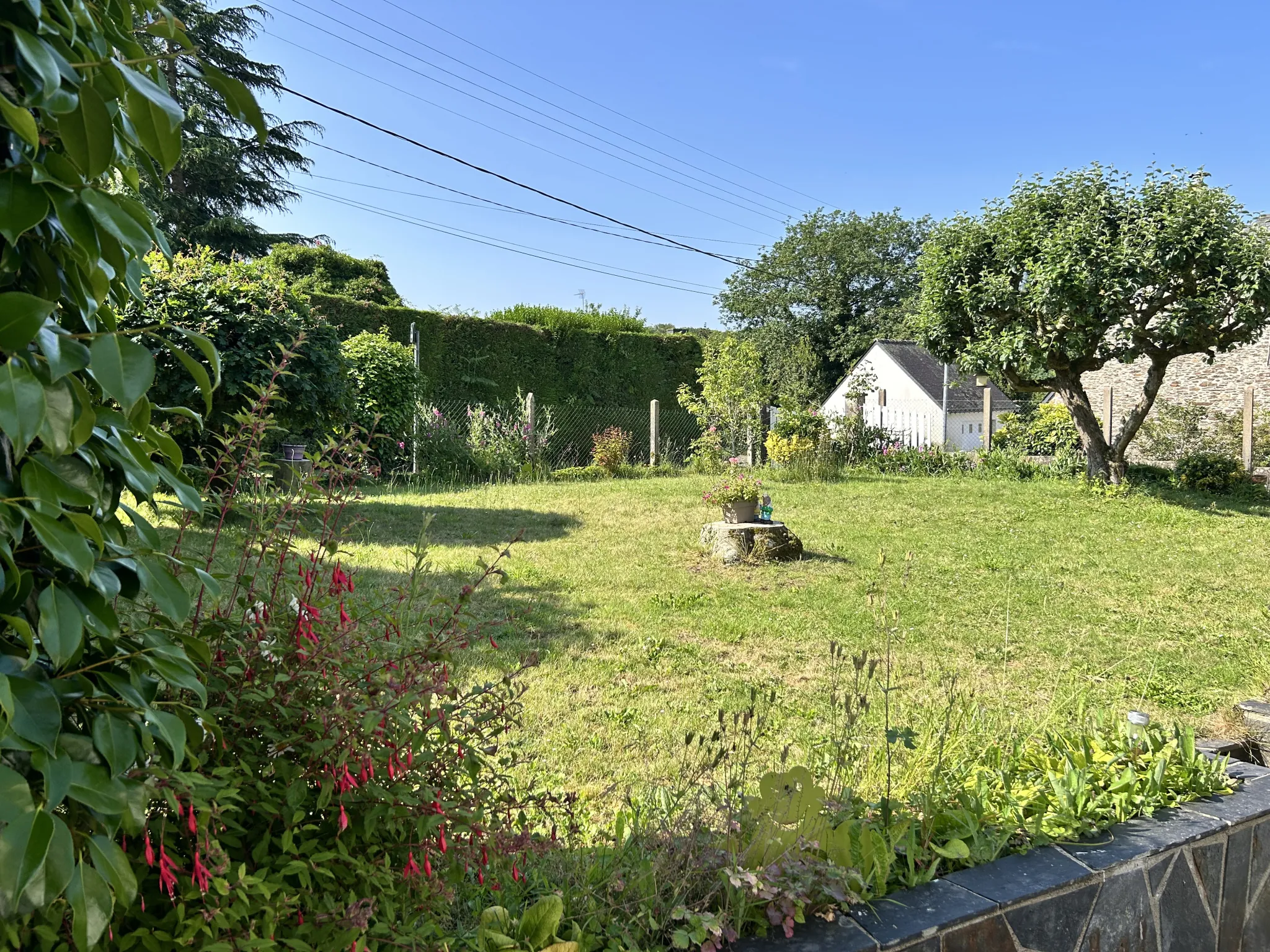 Maison familiale de 87 m² avec jardin et garage à Pluméliau, proche du Blavet 