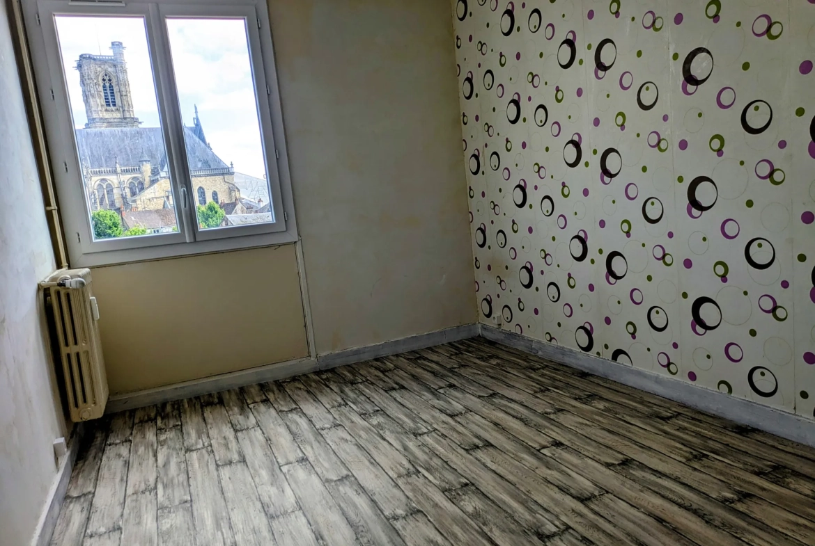Appartement T3 avec balcon et cave en plein centre-ville de Nevers 
