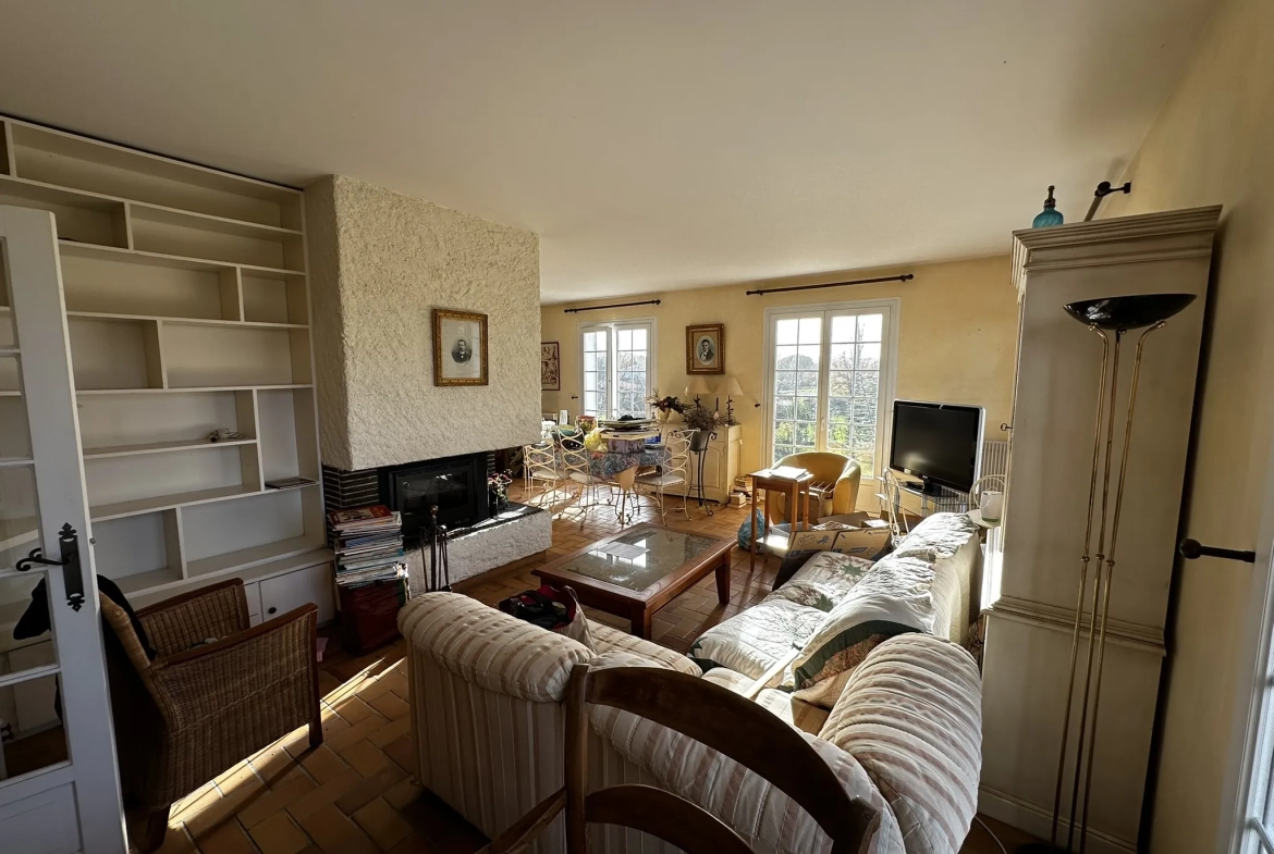 Maison à vendre au Passage avec 4 chambres et terrain arboré de 1145 m² 