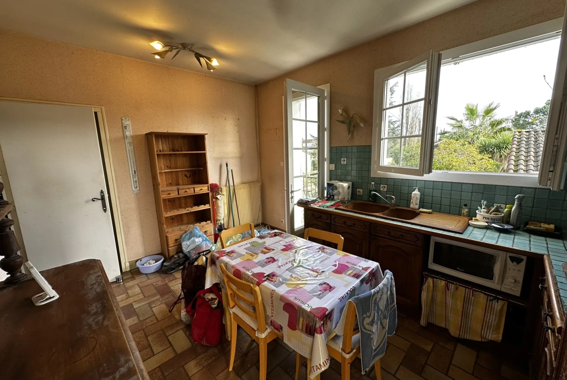 Maison à vendre au Passage avec 4 chambres et terrain arboré de 1145 m² 