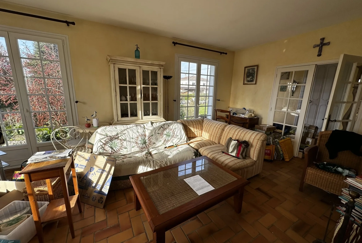 Maison à vendre au Passage avec 4 chambres et terrain arboré de 1145 m² 