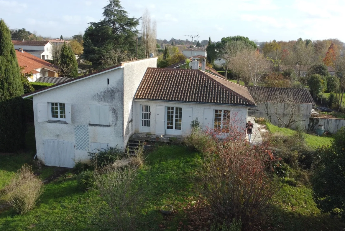 Maison à vendre au Passage avec 4 chambres et terrain arboré de 1145 m² 