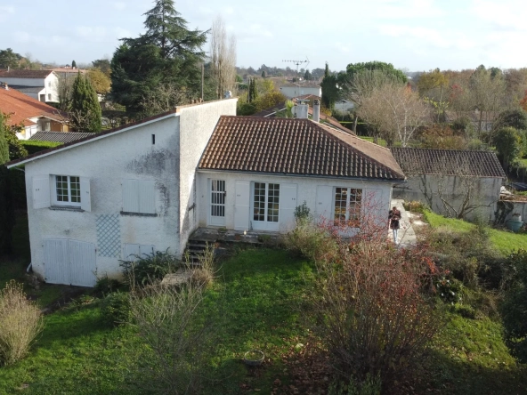 Maison à vendre au Passage avec 4 chambres et terrain arboré de 1145 m²