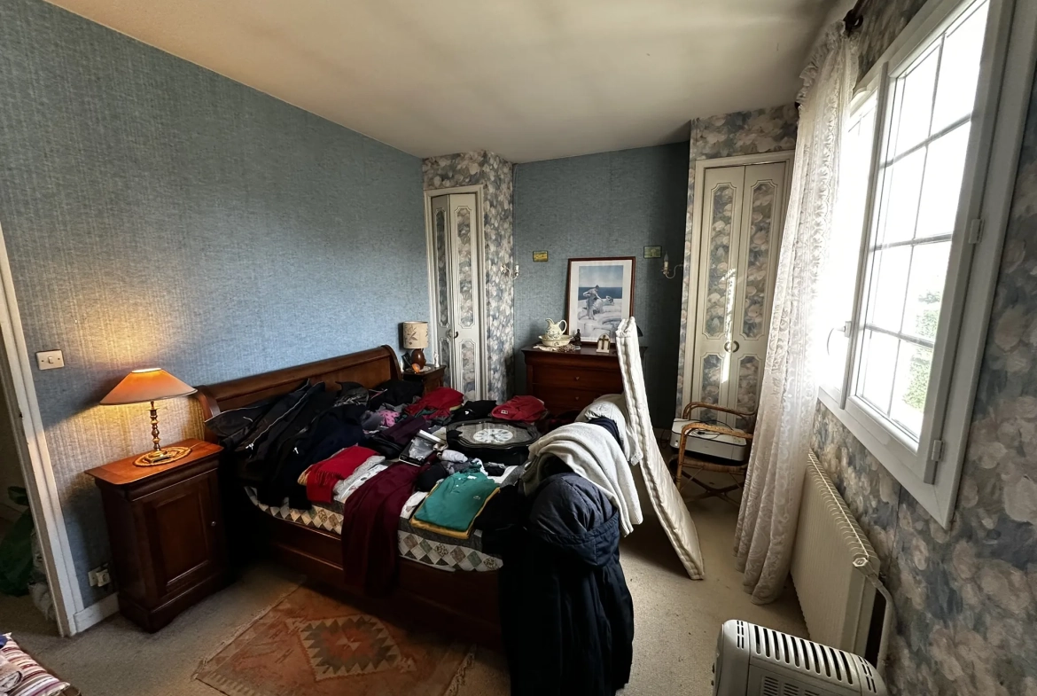 Maison à vendre au Passage avec 4 chambres et terrain arboré de 1145 m² 