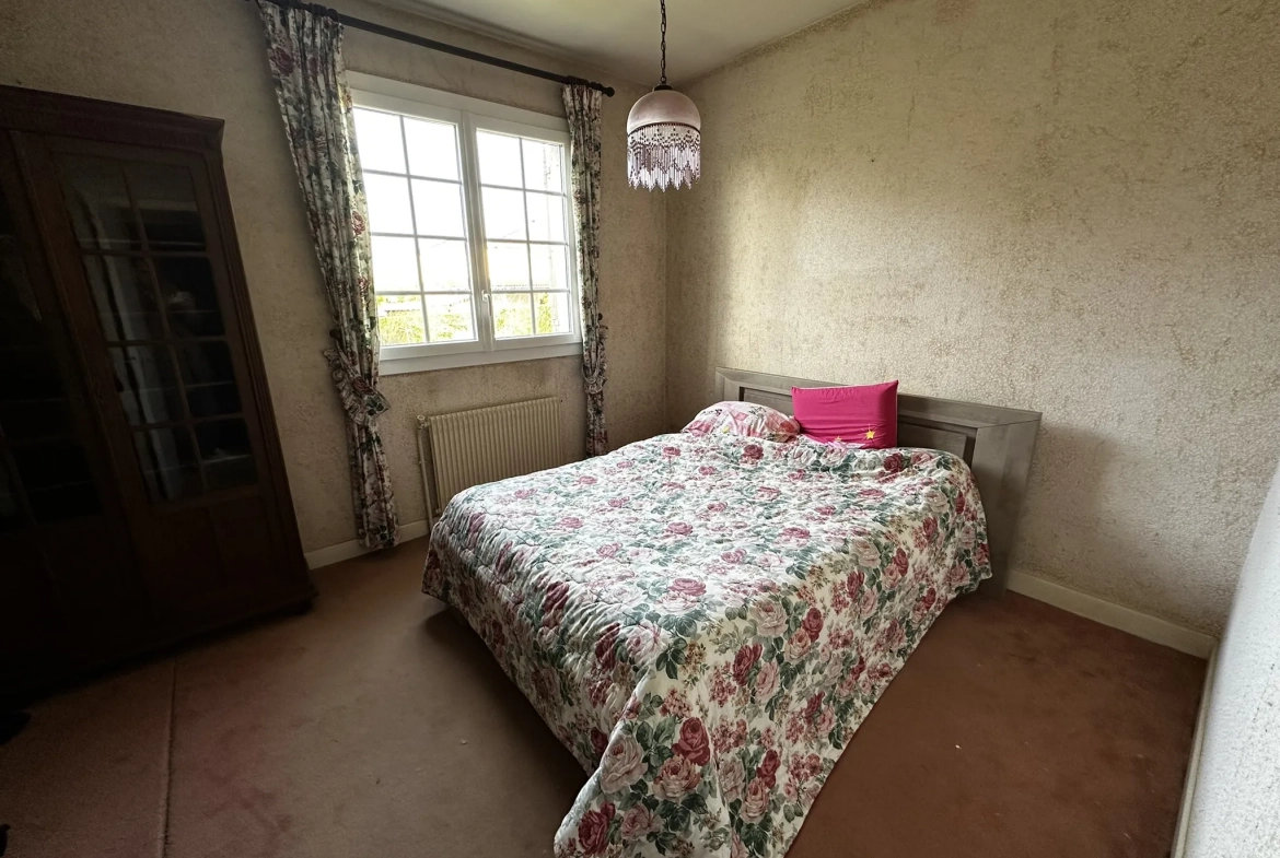 Maison à vendre au Passage avec 4 chambres et terrain arboré de 1145 m² 