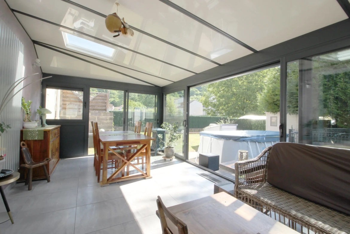 Maison à vendre de 125m² à Moutiers, proche autoroute A4 avec jardin et garage 