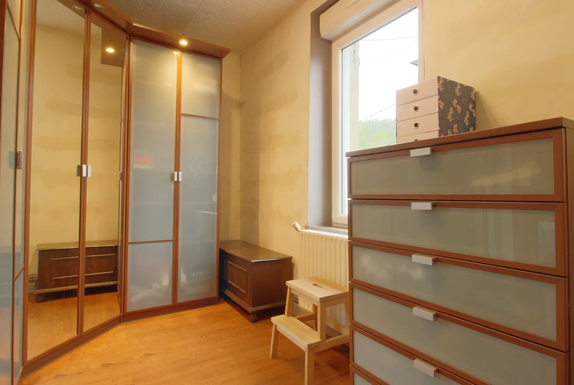 Maison à vendre de 125m² à Moutiers, proche autoroute A4 avec jardin et garage 