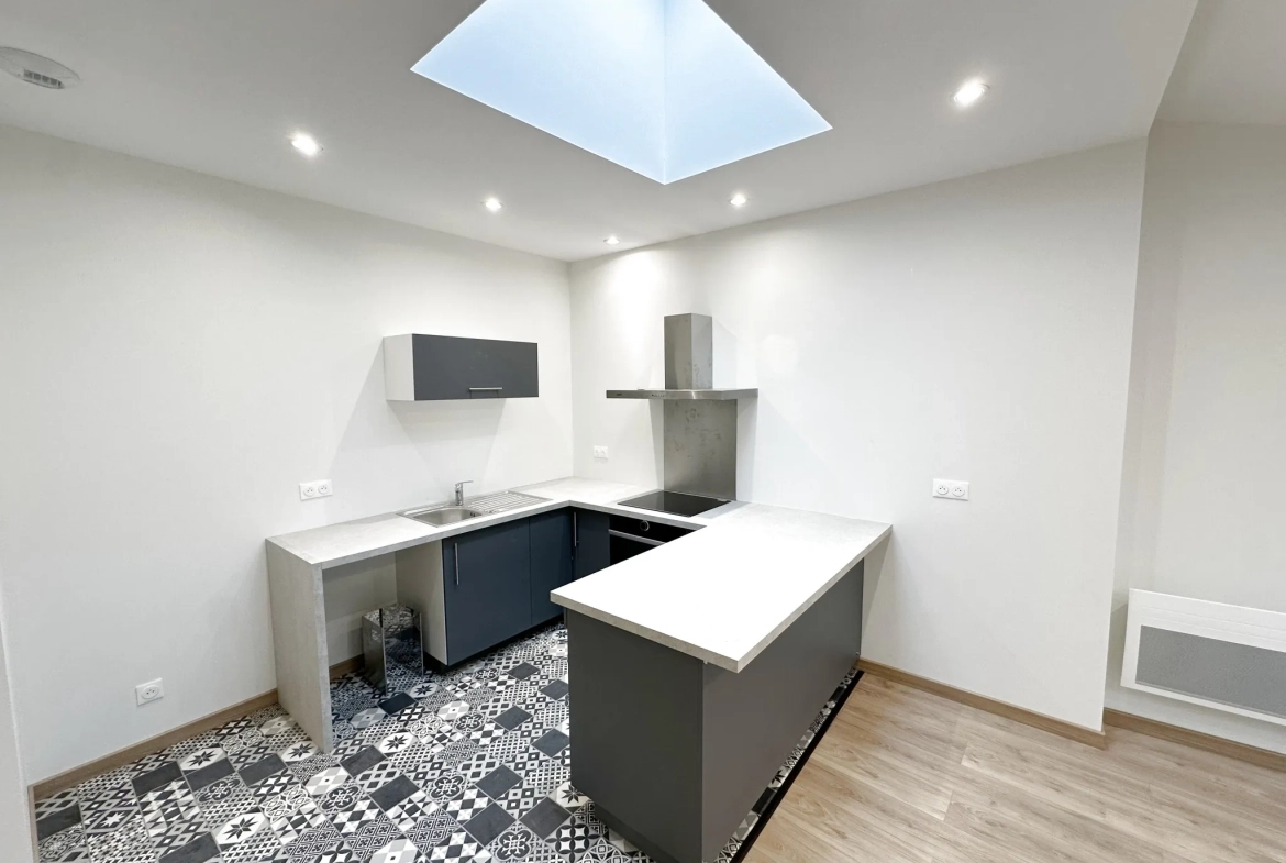 Appartement T2 rénové au centre-ville de Marmande avec box 