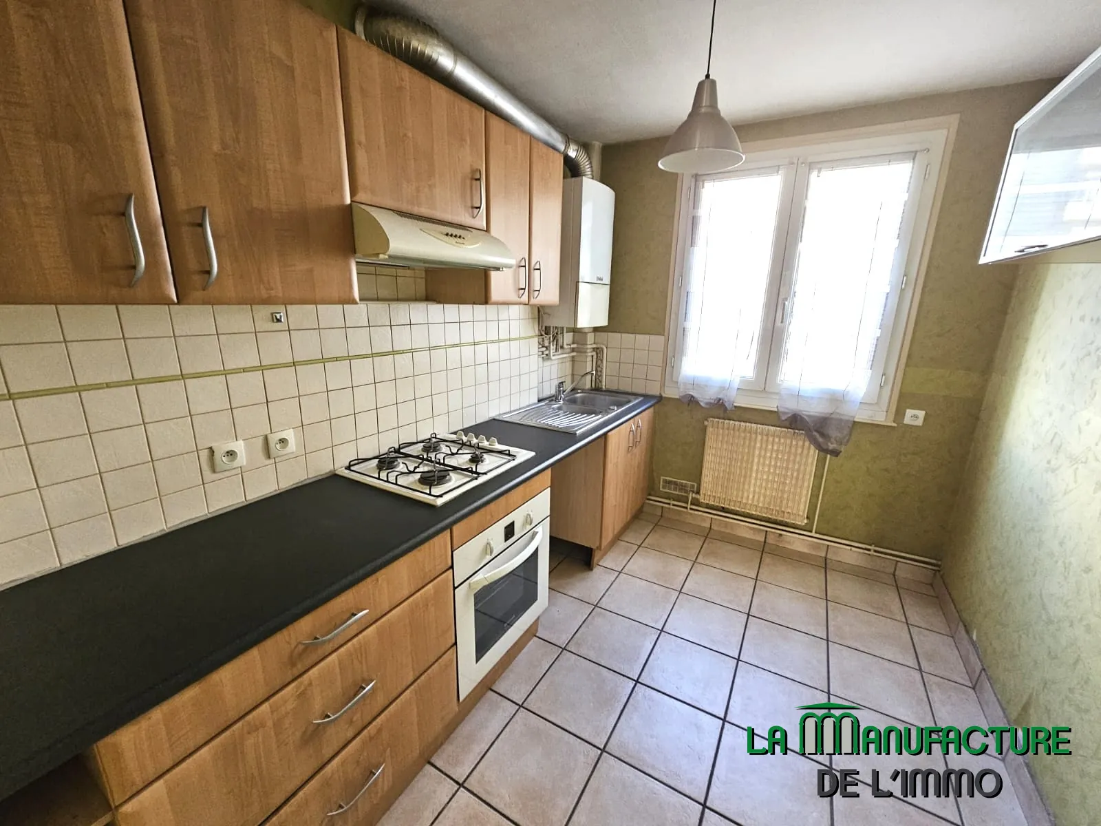 Appartement F4 à Saint-Étienne avec cave et parking, idéal achat premier logement 