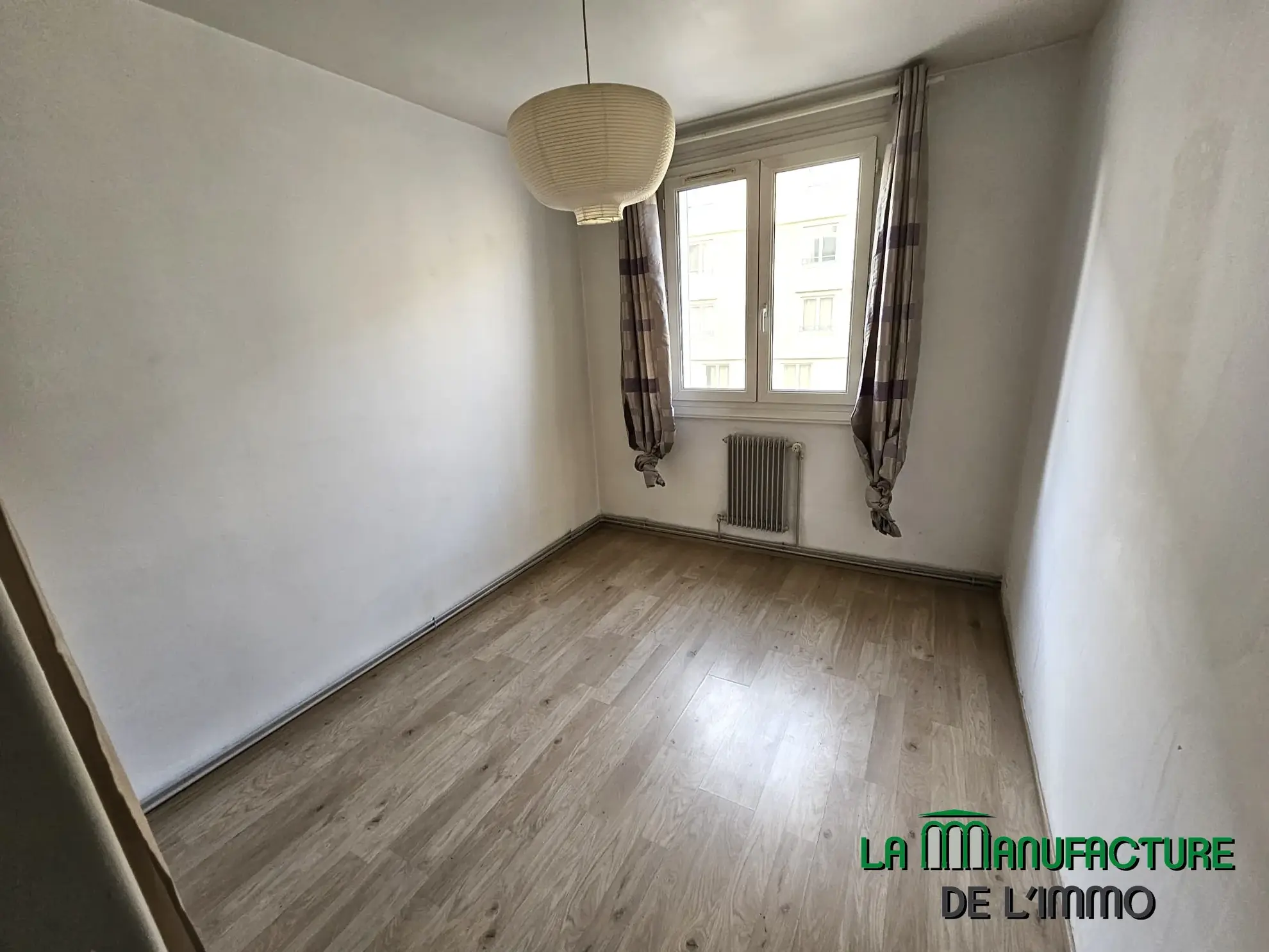 Appartement F4 à Saint-Étienne avec cave et parking, idéal achat premier logement 