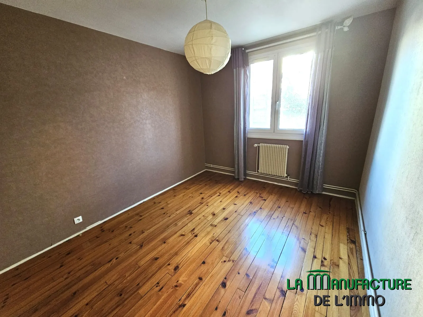 Appartement F4 à Saint-Étienne avec cave et parking, idéal achat premier logement 