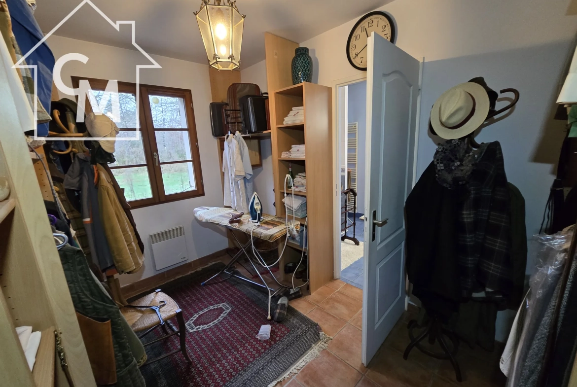 Maison à vendre à Nancay avec jardin clos de 1750 m², 3 chambres, garage et espace de vie spacieux 