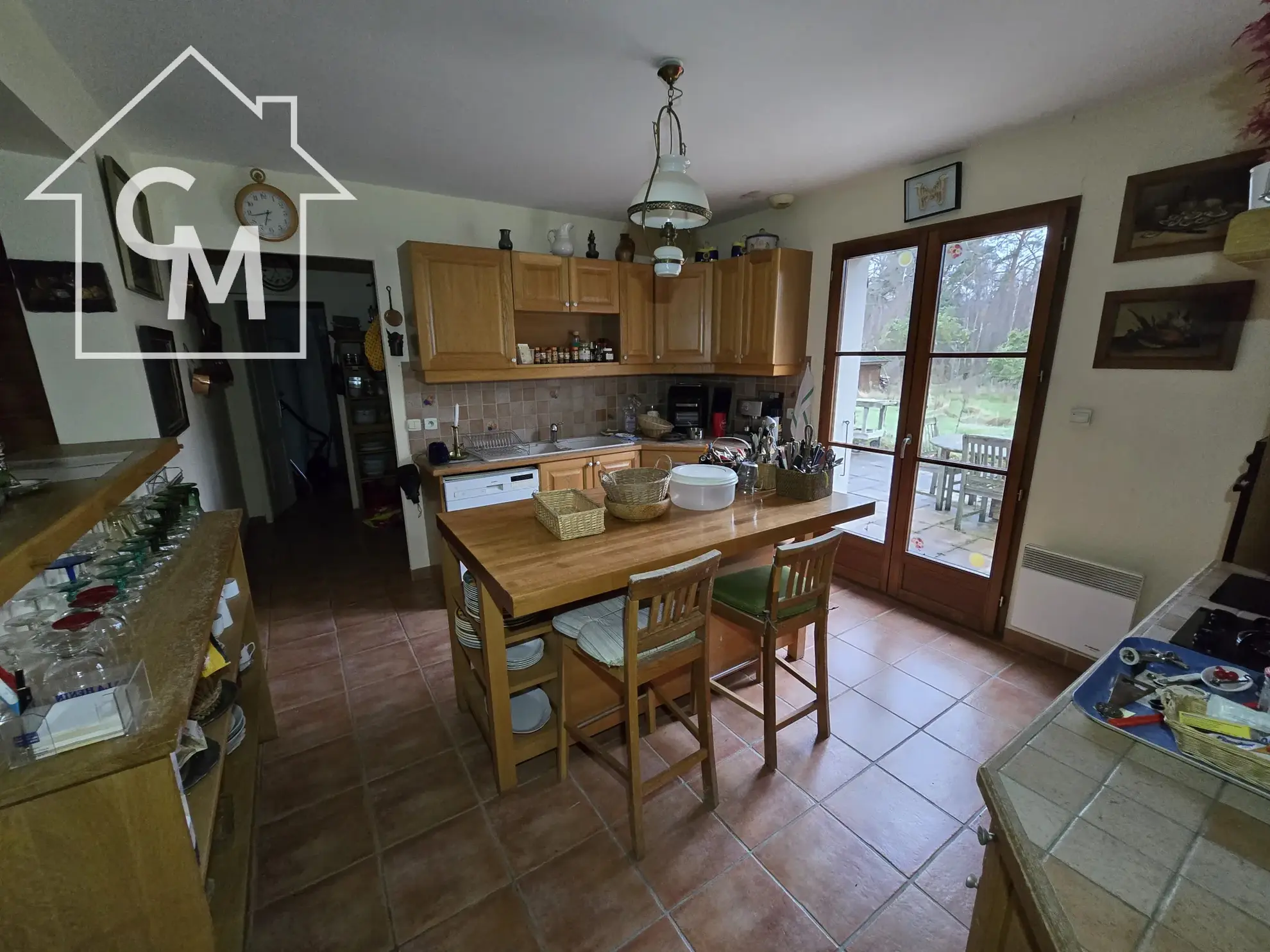 Maison à vendre à Nancay avec jardin clos de 1750 m², 3 chambres, garage et espace de vie spacieux 
