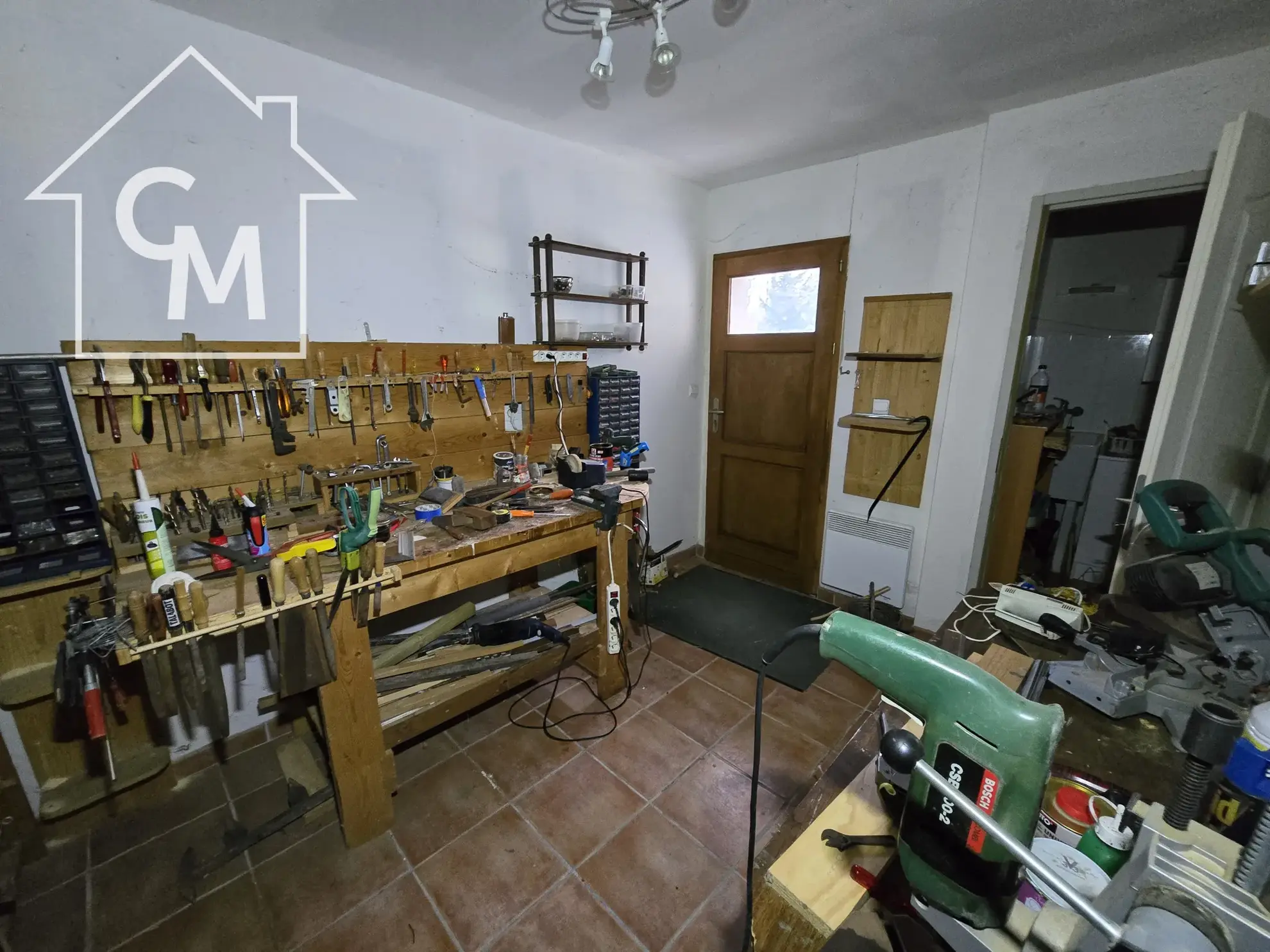 Maison à vendre à Nancay avec jardin clos de 1750 m², 3 chambres, garage et espace de vie spacieux 