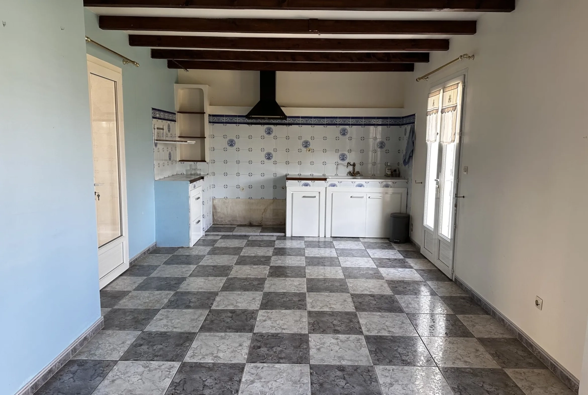 Maison à Villegailhenc de 102 m² avec 3 chambres, vérandas et garage 