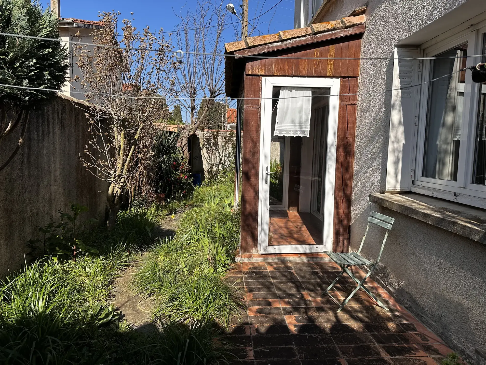 Maison à Villegailhenc de 102 m² avec 3 chambres, vérandas et garage 