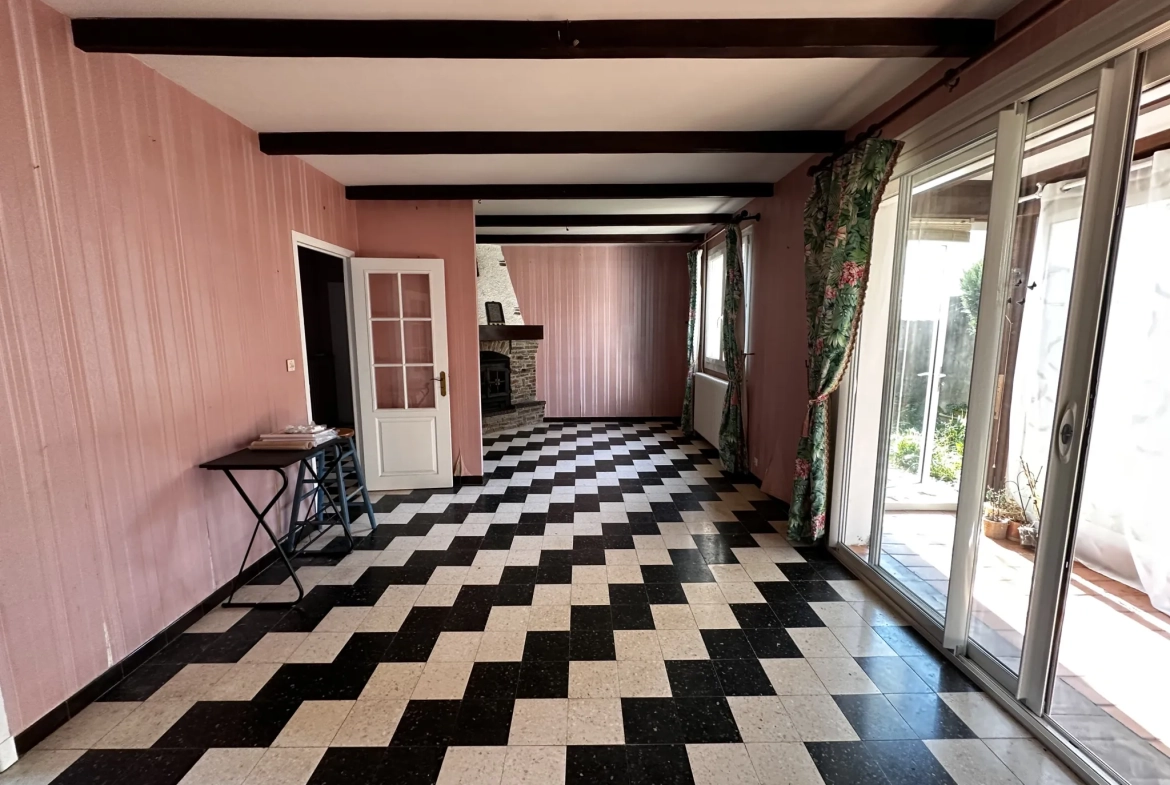 Maison à Villegailhenc de 102 m² avec 3 chambres, vérandas et garage 