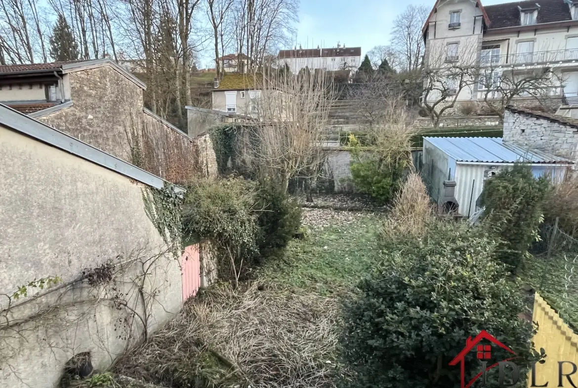 Spacieuse maison multi-logements de 166 m² avec terrain à Bourbonne-les-Bains 