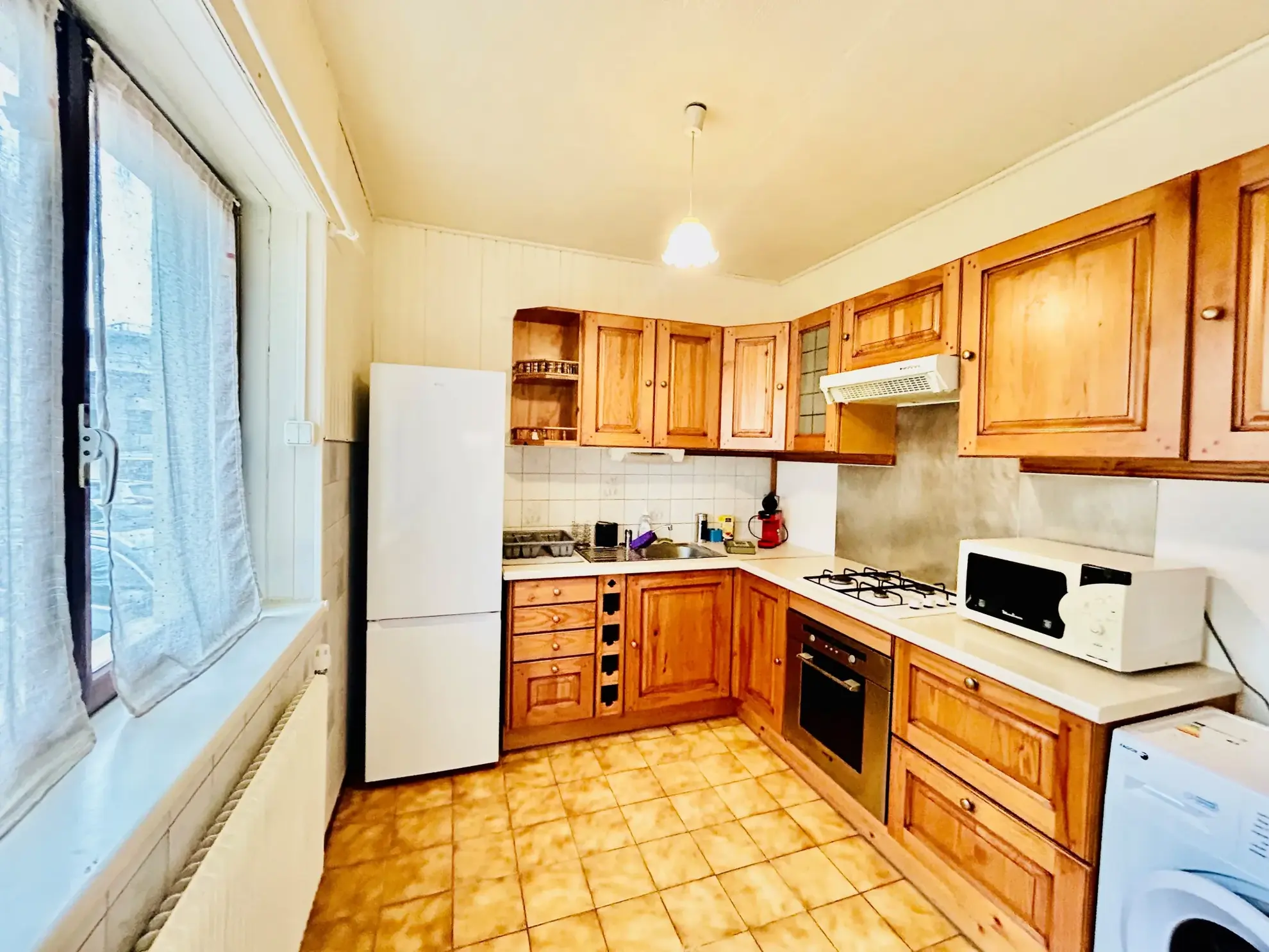 Appartement 2 pièces lumineux avec grand balcon en rez-de-jardin 
