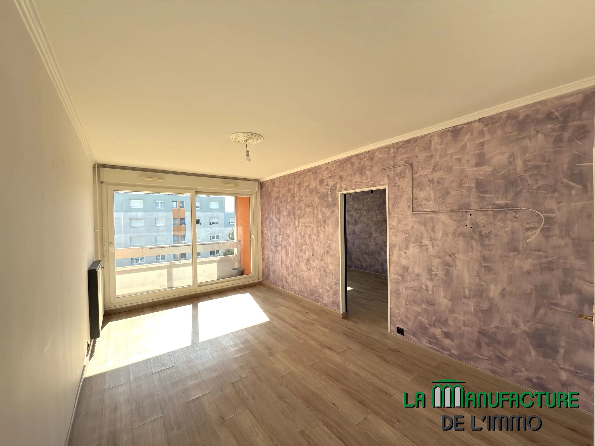 Appartement F4 rénové avec balcon, cave et garage à Montreynaud, Saint-Étienne 