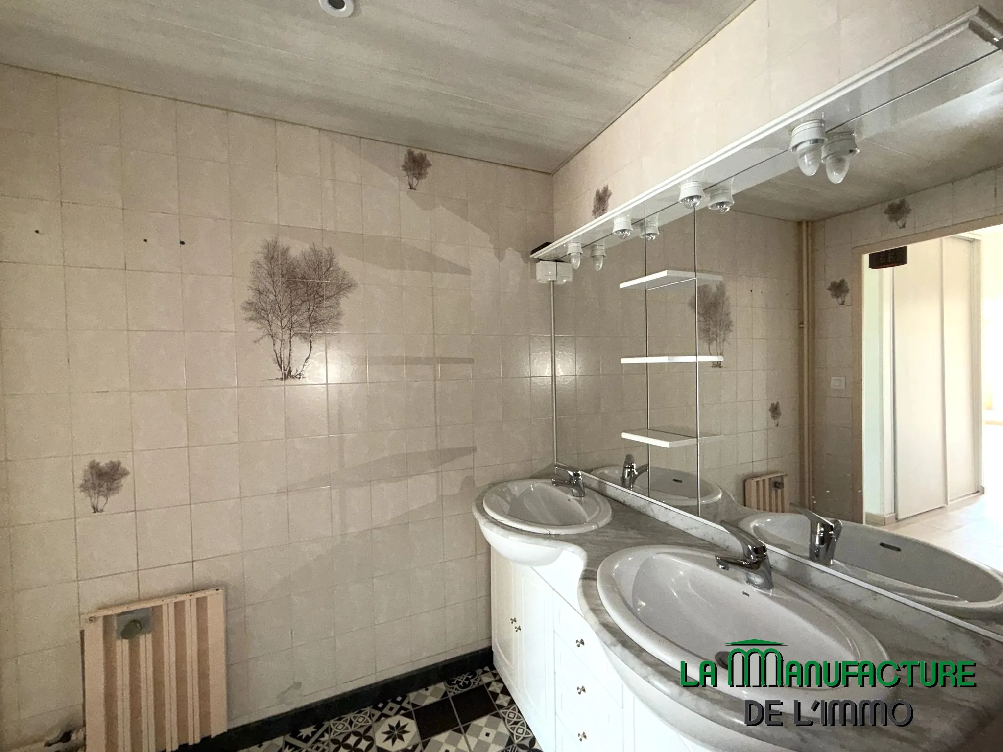 Appartement F4 rénové avec balcon, cave et garage à Montreynaud, Saint-Étienne 