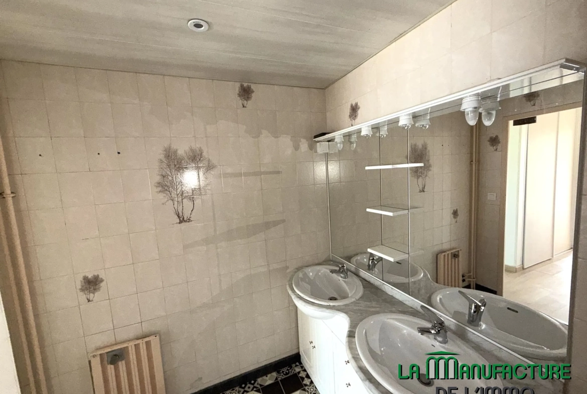 Appartement F4 rénové avec balcon, cave et garage à Montreynaud, Saint-Étienne 