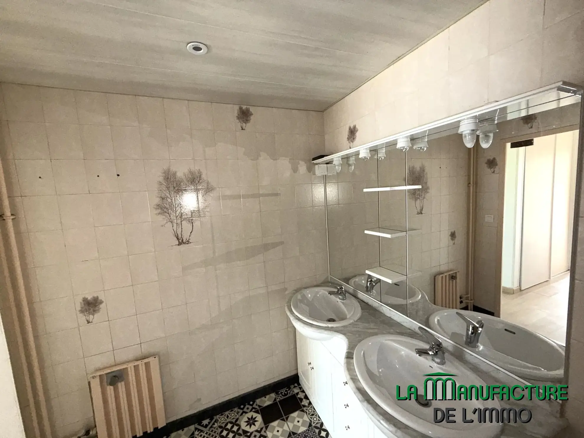 Appartement F4 rénové avec balcon, cave et garage à Montreynaud, Saint-Étienne 