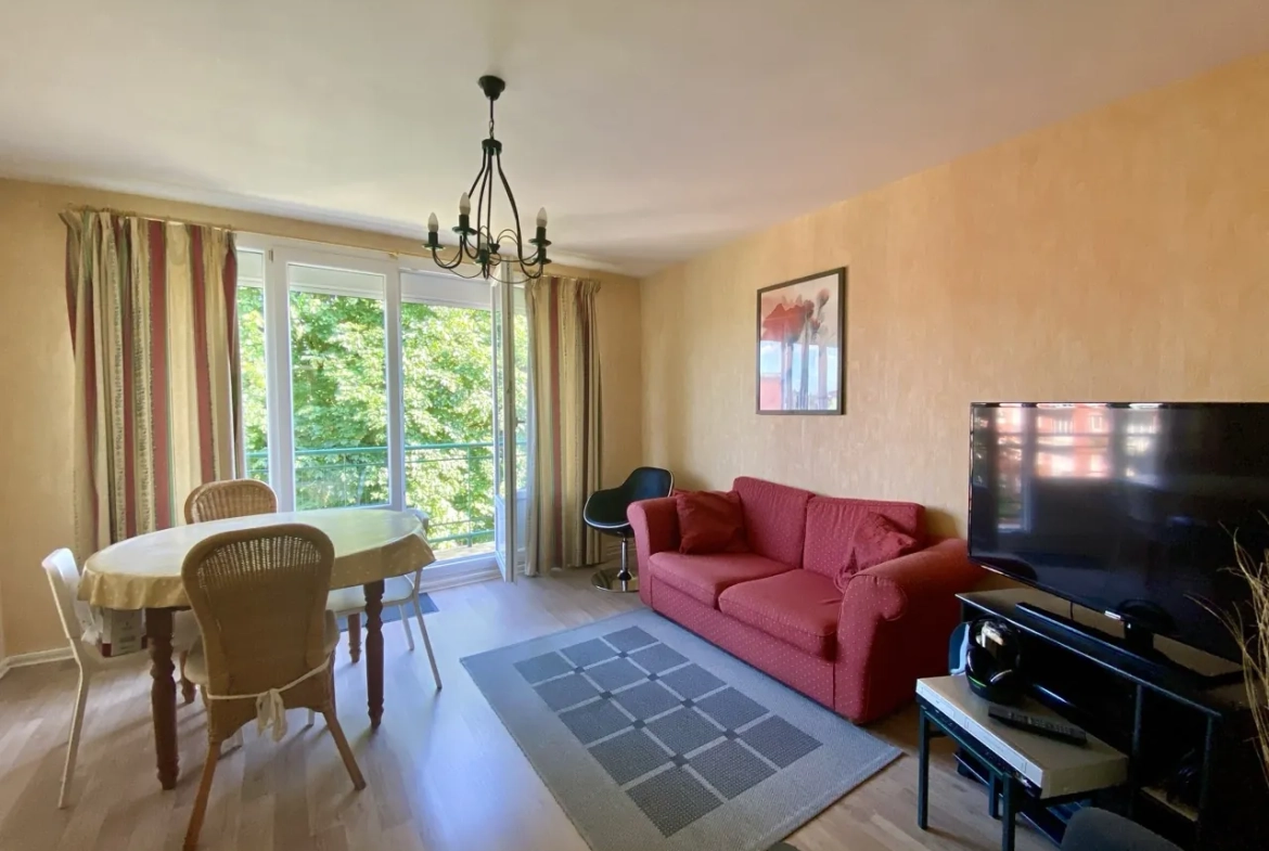 Appartement 4 chambres à Rousies dans résidence calme avec balcon, caves et garage 