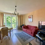 Appartement 4 chambres à Rousies dans résidence calme avec balcon, caves et garage