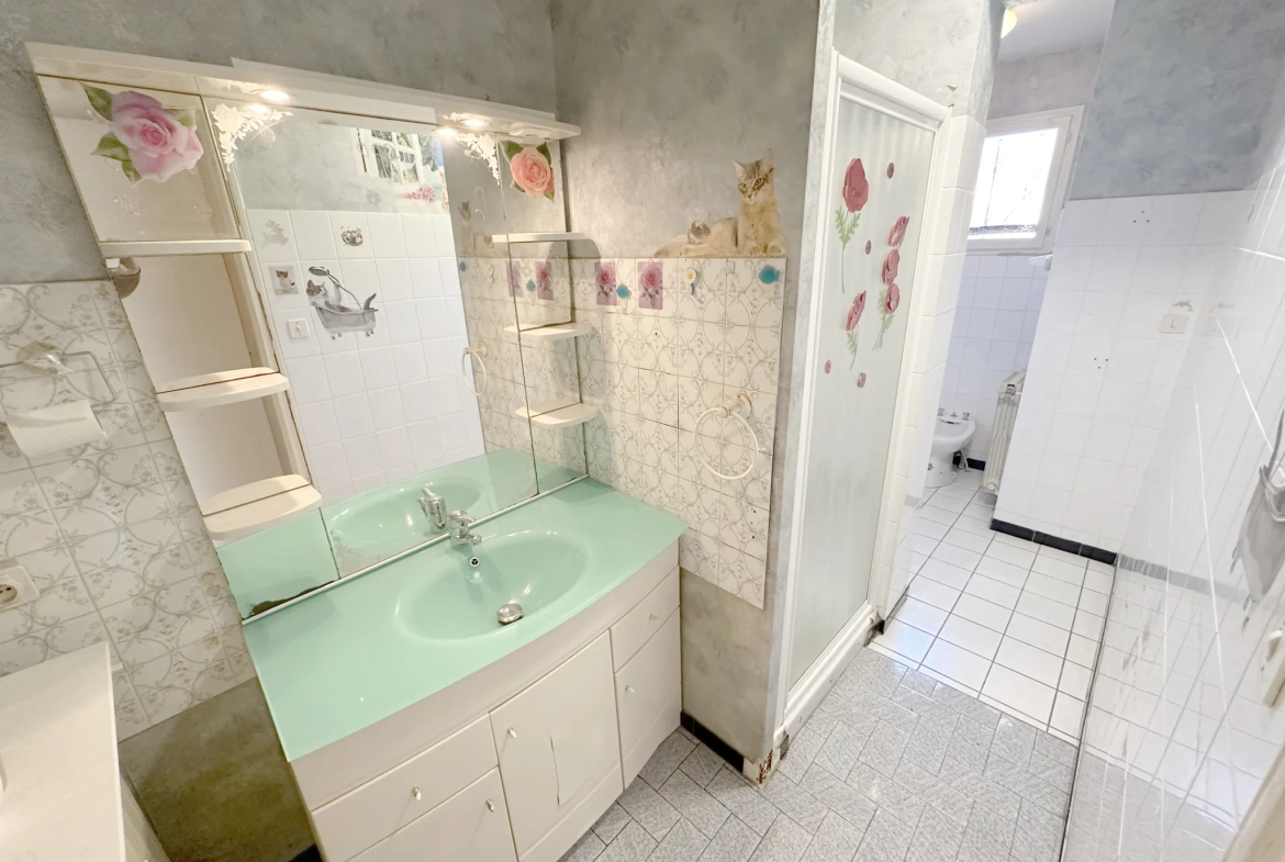 Maison de plain-pied à Sainte-Bazeille avec jardin et garage 