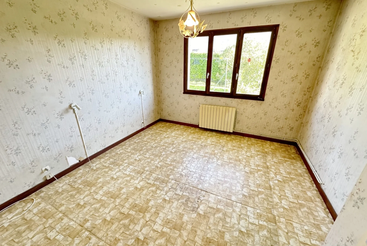 Maison de plain-pied à Sainte-Bazeille avec jardin et garage 