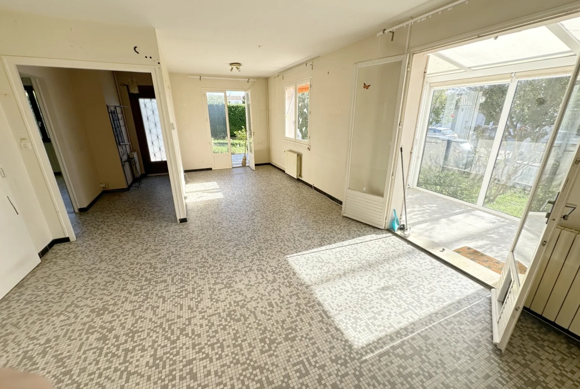 Maison de plain-pied à Sainte-Bazeille avec jardin et garage 