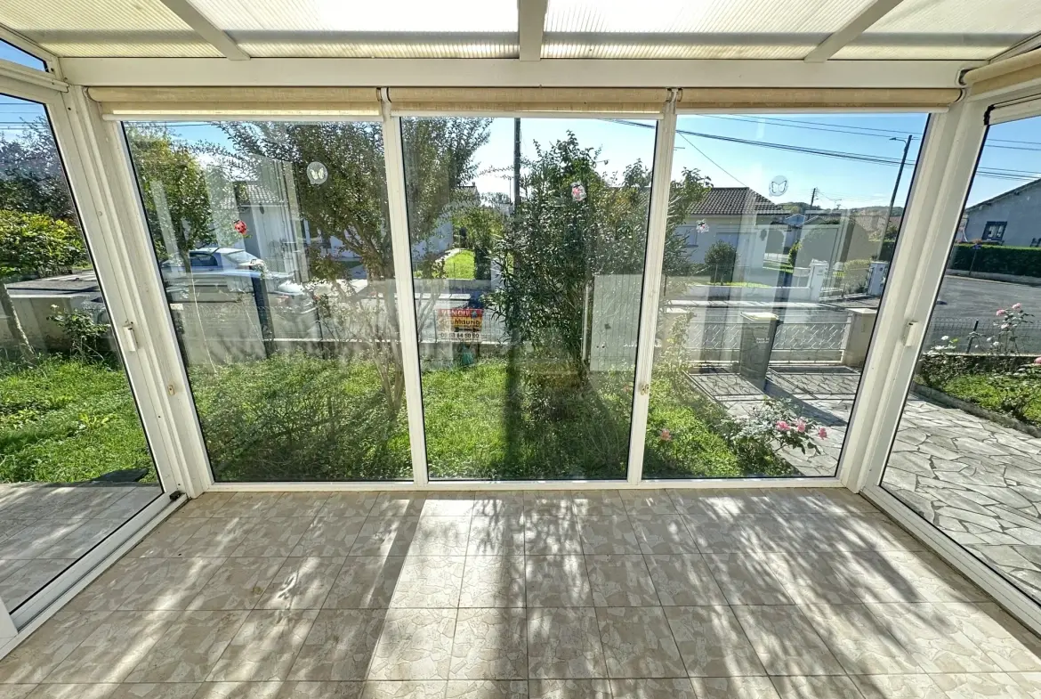 Maison de plain-pied à Sainte-Bazeille avec jardin et garage 