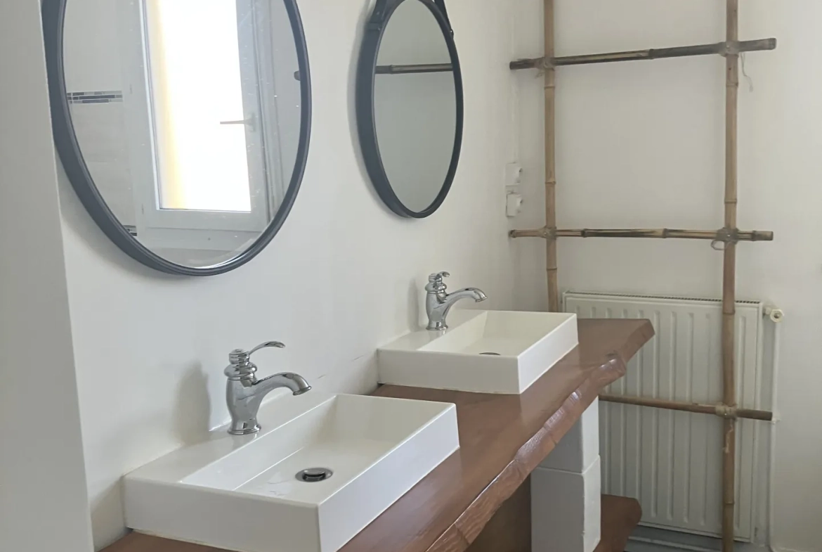 Appartement à Paimboeuf avec balcon, garage et cave - 3 chambres, proche commodités 
